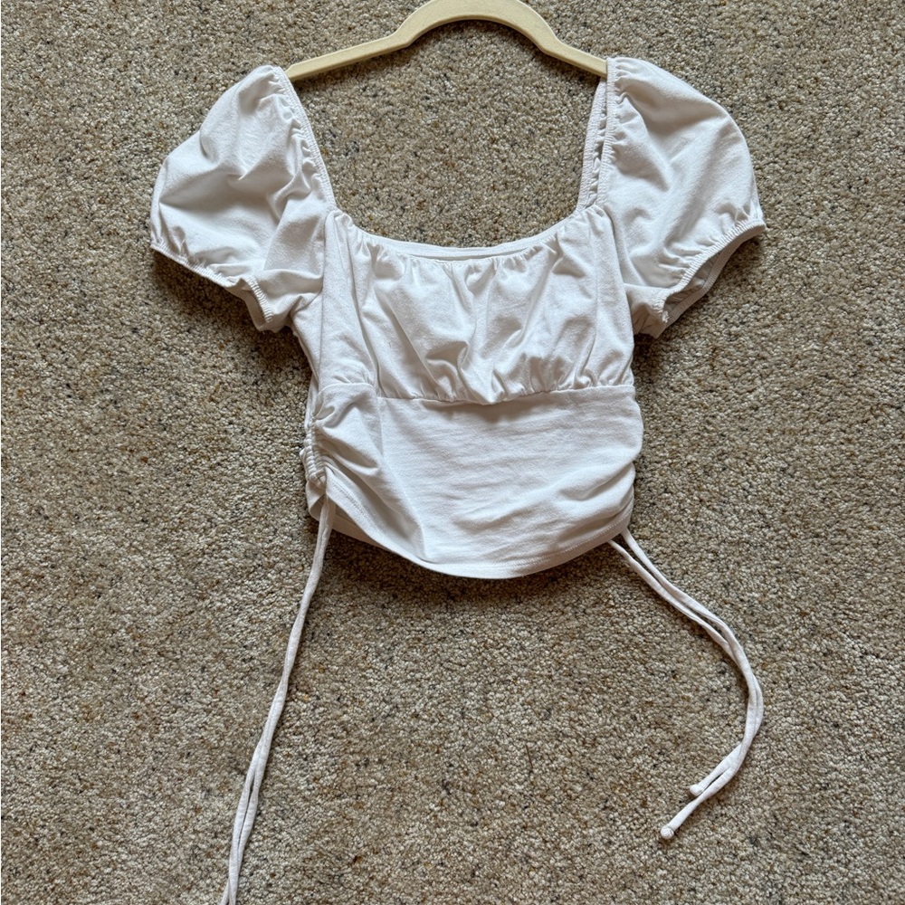 White puffed sleeve top